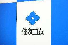 Sumitomo Rubber Industries signboard and logo